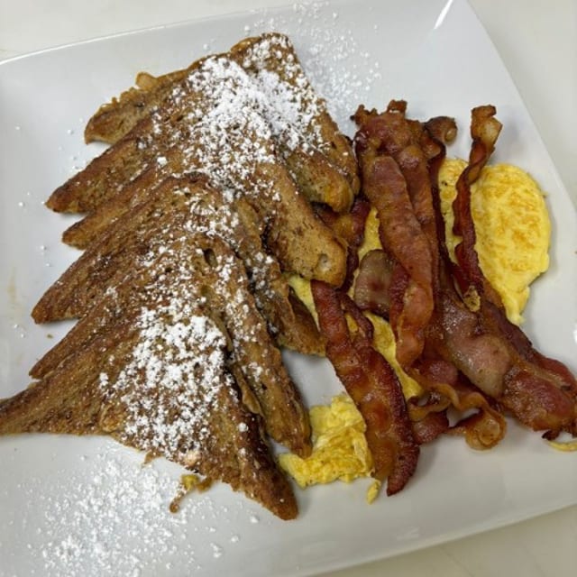 French Toast with Choice of Meat and 2 Eggs.