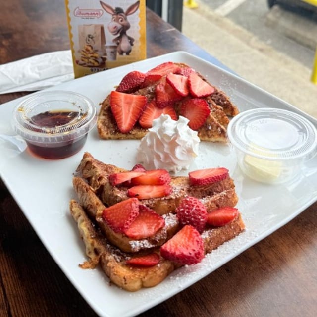 French Toast with Mixed Fruits and Whipped Cream.